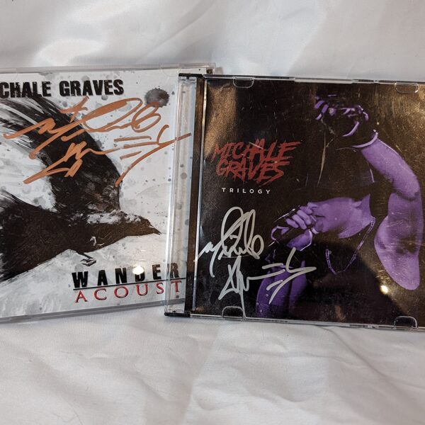 Autographed Michale Graves CDs.